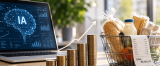 Investimento em IA representado por um notebook com inteligência artificial, pilhas de moedas em crescimento e uma cesta de compras, ilustrando como o investimento em IA pode pressionar a inflação no curto prazo.